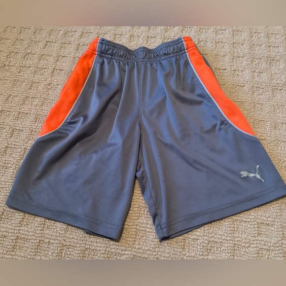 Puma gray shorts with orange/white accents includes pockets in XS - Picture 1 of 3